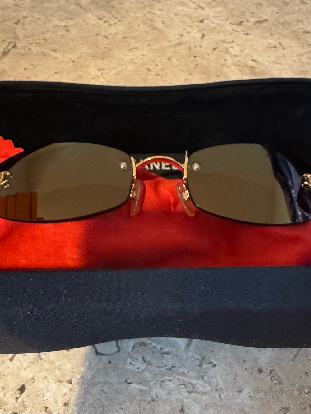 CHANEL Gold-Trim Rimless Sunglasses with Brown Lenses